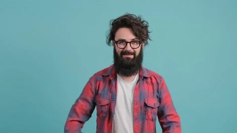 Portrait of satisfied bearded man doing thumbs up gesture. Stock Footage 139692299
