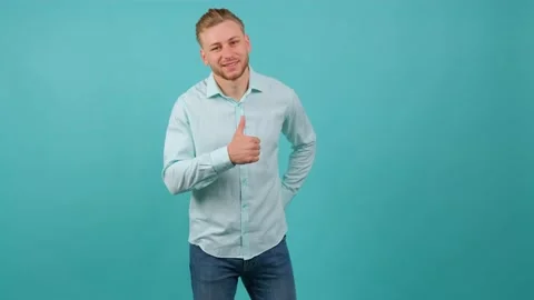 Portrait of satisfied bearded man doing thumbs up gesture. Stock Footage 142097767