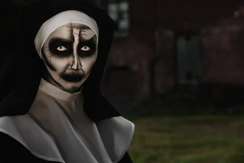 Portrait of scary devilish nun outdoors, space for text. Halloween party look Stock Photos