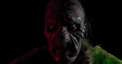 Portrait of a scary orc looking, panting and screaming, close up, 4k Stock Footage 133029998