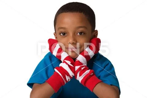 Portrait of a school child boy laying down. Studio shot. Isolated Stock Photos