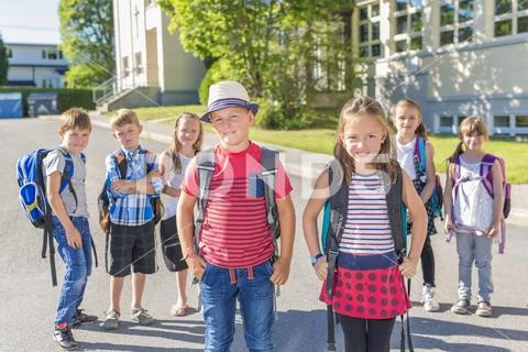 Portrait Of School Pupils Outside Classroom Carrying Bags Stock Image ...