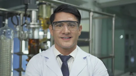 A portrait of scientist man smiling in lab or laboratory in technology medica Video stock 201978194