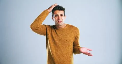 Portrait, scratching head and question with man in studio for doubt, problem Stock Photos