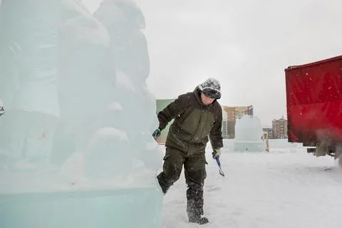Portrait of a sculptor at work with a chisel 스톡 사진