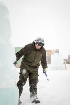 Portrait of a sculptor at work with a chisel 스톡 사진