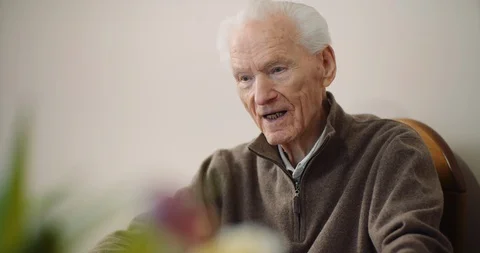 Portrait of senior man talking Stock Footage 126666404
