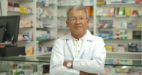 Portrait of senior pharmacist looking at camera. Stock Footage 124233020
