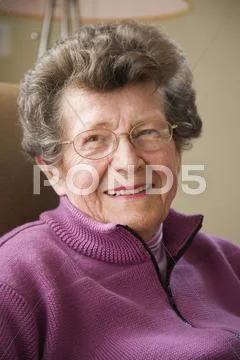 Portrait of senior woman smiling Stock Photos