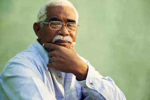 Portrait of serious african american old man looking at camera Stock Photos