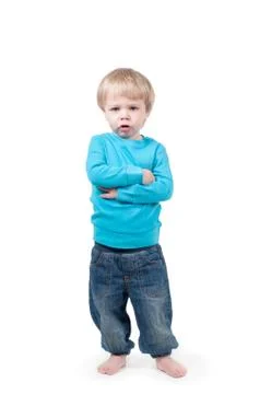 Portrait of a serious boy looking at camera Stock Photos