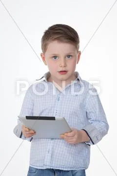 Portrait of serious child on white background Stock Photos