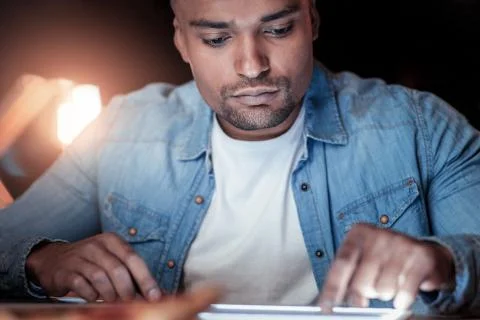 Portrait of serious worker that testing device Stockfoto's