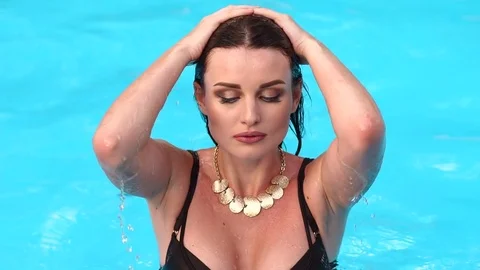 Portrait of sexy erotic wet girl in the pool. Stock Footage