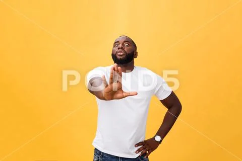 Portrait shock and annoyed displeased young man raising hands up to say no stop Stock Photos