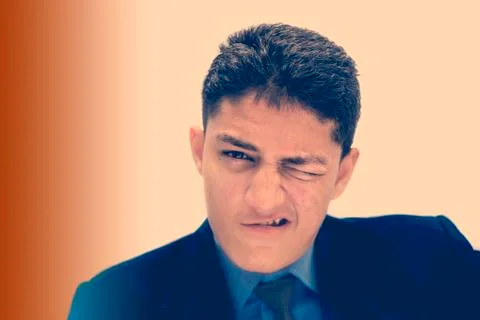 Portrait shot exhausted of apprentice young businessman isolated on gradient Stock Photos