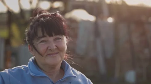 Portrait shot of a Lovely middle aged woman on her farm Stock Footage