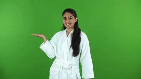 Portrait shot of a young Indian model comparing the benefits of a good skin c... Stock Footage 275809506