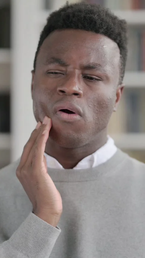 Portrait of Sick African Man having Toothache, Vertical Video Stock Footage 339576955
