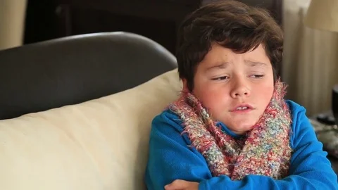 Portrait of a sick child feeling cold in winter Stock Footage 70028706