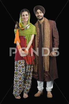 Portrait of a Sikh couple smiling Stock Photos