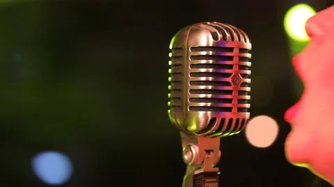 Portrait of singer with retro microphone Stock Footage 106892606