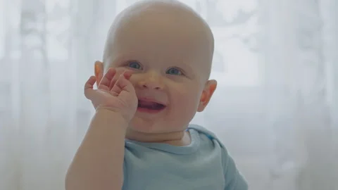 Portrait of six month old smiling baby boy 2 Stock Footage 264875440
