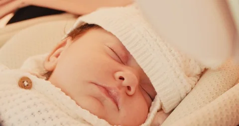 Portrait of sleeping baby in buggy 動画素材 127446792