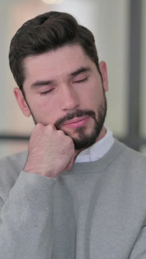 Portrait of Sleepy Young Man taking Nap in Office, Vertical Video Stock-Footage 339583163