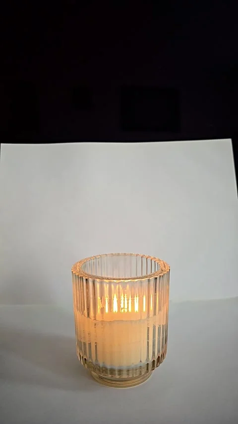 Portrait Slow Motion Video of a Candle Burning Stock Footage 308659460