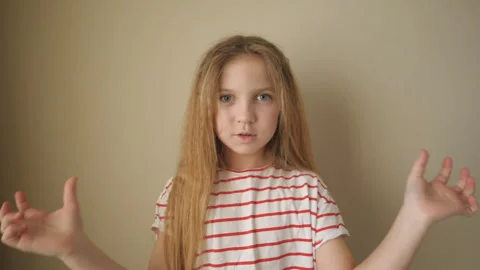 Portrait of small blonde girl looking in... | Stock Video | Pond5