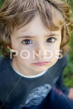 Portrait of a small child in the field Stock Photos