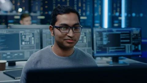 Portrait of a Smart and Handsome Software Developer Wearing Glasses Working Stock Footage 103518000