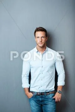 Portrait of smart man against gray background Stock Photos