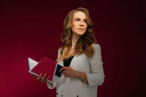 Portrait of smart young lady touch chin learning in university reading Stock Photos