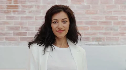 Portrait of a smiling 45 year old Spanish woman looking at camera. Stock Footage 162352775