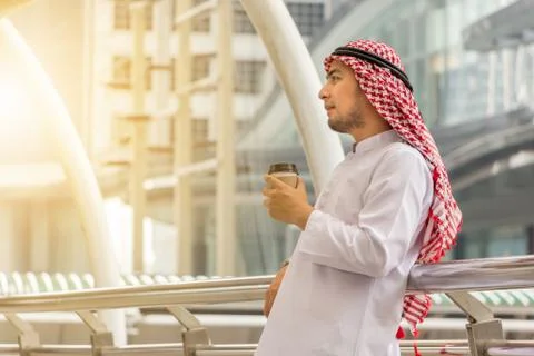 Portrait of Smiling Arab Middle Eastern Businessman Enjoy with coffee Фото