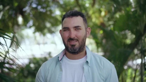 Portrait of smiling bearded man standing outdoors Stock Footage 337905685