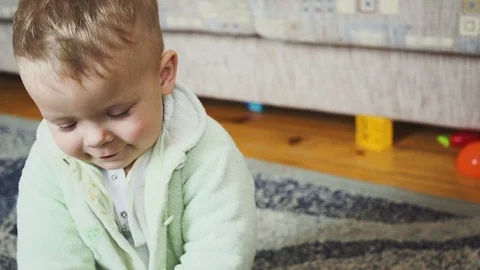 Portrait of a smiling boy in a room 스톡 동영상 86230040