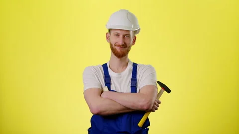 Portrait Of Smiling Builder, Engineer In Protective Hardhat Wear Blue Uniform Stock Footage 170187004