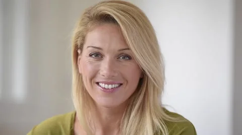 Portrait of smiling businesswoman in office Stock Footage