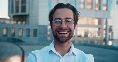 Portrait of smiling ceo executive looking to camera. Male businessman in 30s Stock Footage 164839641