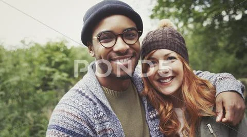 Portrait smiling couple hugging Stock Photos