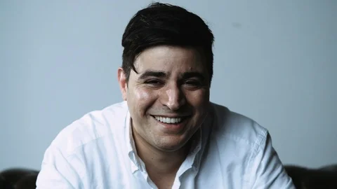 Portrait of Smiling Dark Haired Man Stock Footage 120426965