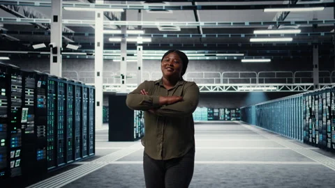 Portrait of smiling data center admin conducting security audit Stock Footage 317124999