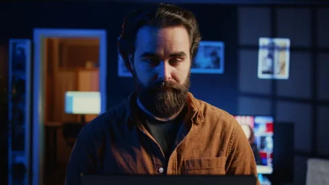 Portrait of smiling developer writing complex binary code scripts on laptop Stock Footage 265618096