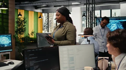 Portrait of smiling engineer working in office, using AI specialized hardware Stock Footage 323029885