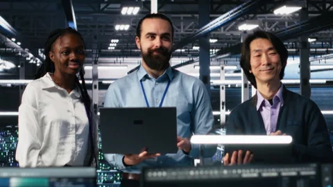 Portrait of smiling engineers in data center code with generative AI Stock Footage 313635075