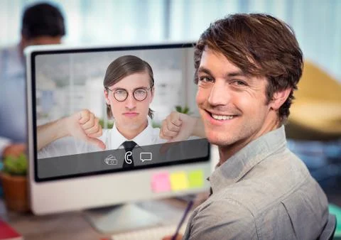 Portrait of smiling executive using computer Foto stock