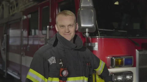 Portrait of a Smiling Firefighter at the Station Stock Footage 208721975